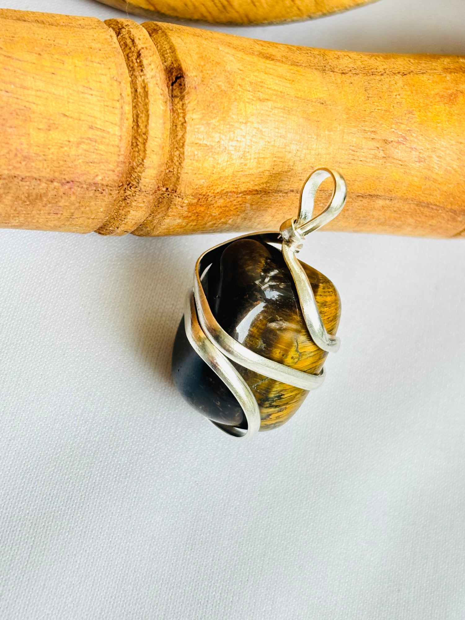 Boosts Your Confidence Level & Exalts the Planet Ketu: Tiger Eye Wrapping Pendant