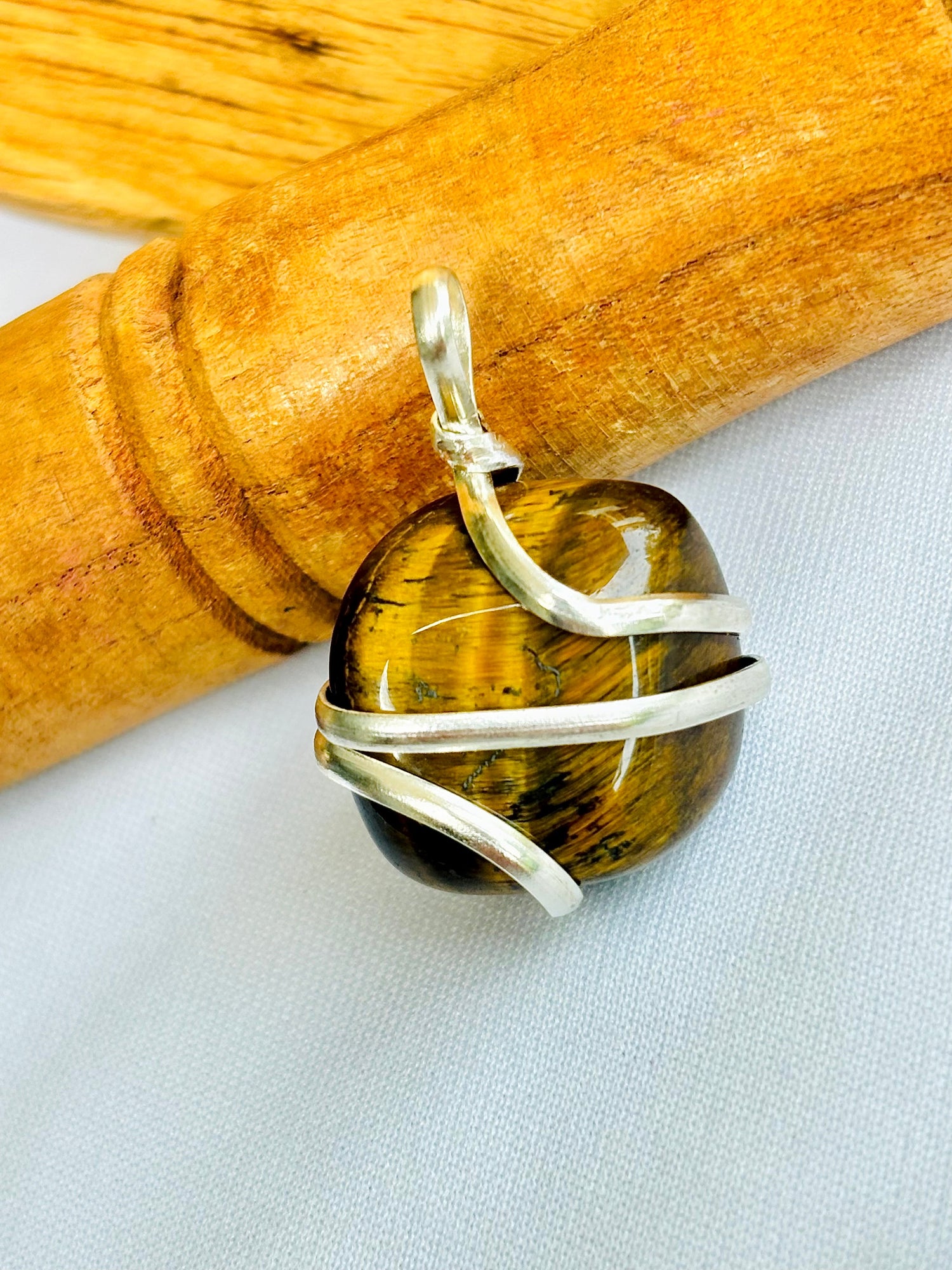 Boosts Your Confidence Level & Exalts the Planet Ketu: Tiger Eye Wrapping Pendant
