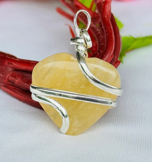 Fulfill Your Desires with Divine Blessings: Yellow Aventurine Heart Wrapped Pendant