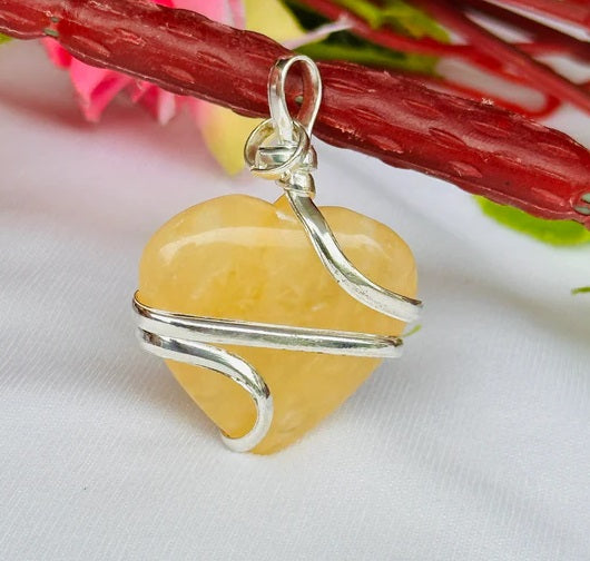 Fulfill Your Desires with Divine Blessings: Yellow Aventurine Heart Wrapped Pendant